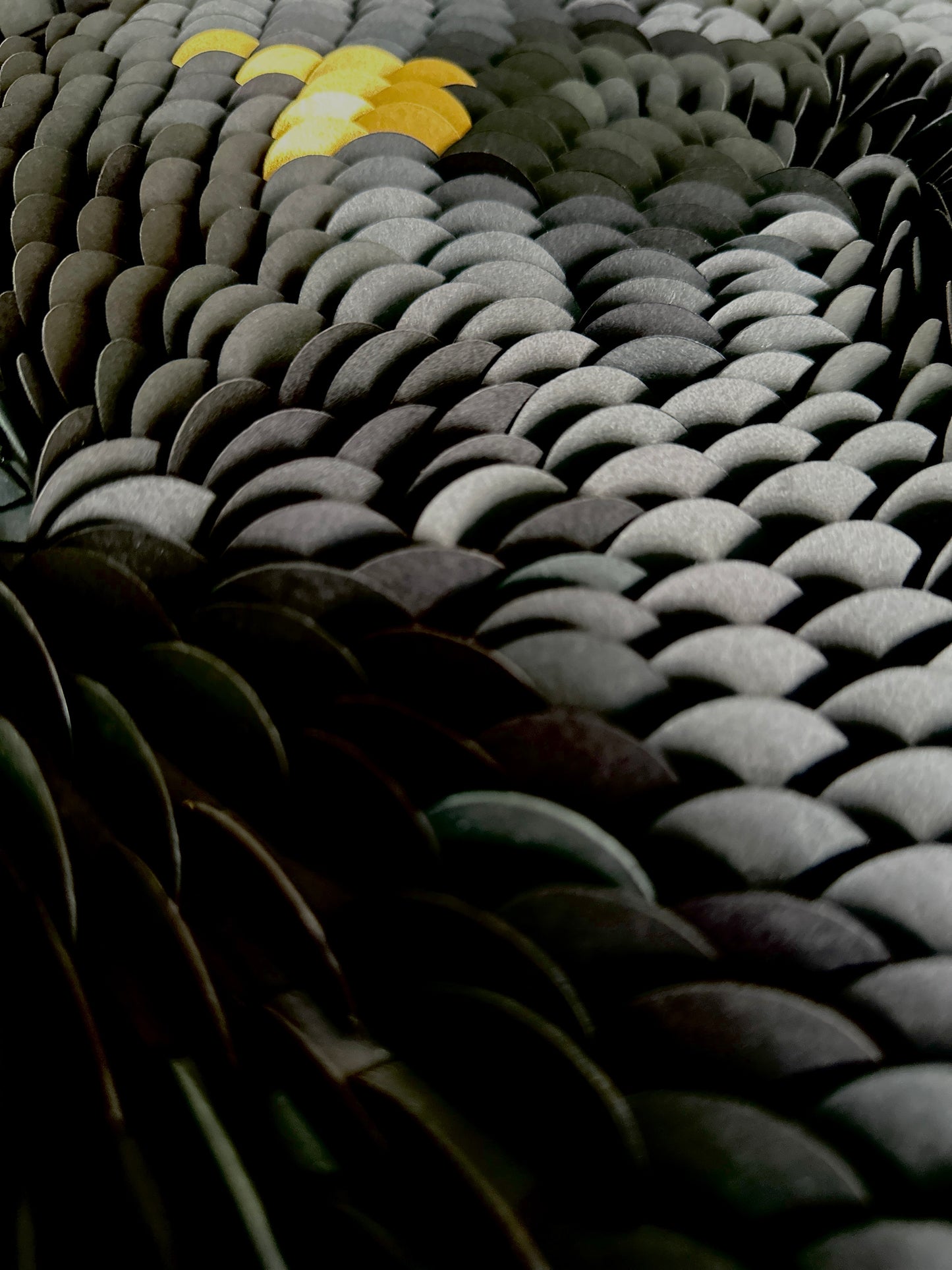 Close up of original textured wall art with black and gold details by artist Tam M Olson