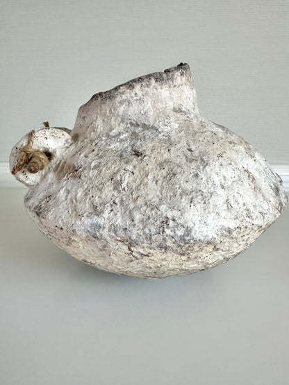 Decorative stone like sculpture on a plain background. Handcrafted original design by artist Tam M Olson