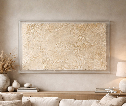 An origami wall art piece with a flowing disposition, encased in a clear acrylic shadow box displayed above a console table with neutral color scheme and minimalist decor. Original artwork by Artist Tam M Olson